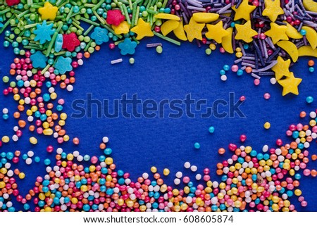 Sugar sprinkle dots, colored decoration for cake and bekery, a lot of sprinkles as a background