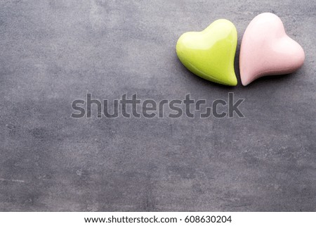 Valentines day greeting card. Colored heart on the gray background. View from above. Flat lay. 
