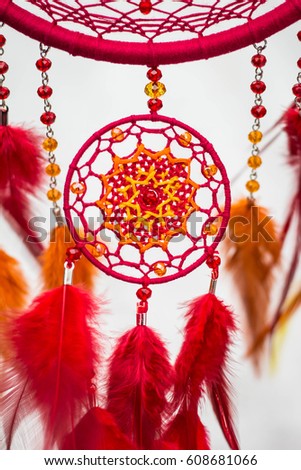 Dreamcatcher made of feathers leather beads and ropes, hanging