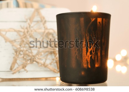 Festive atmosphere with a candle with interesting design. 