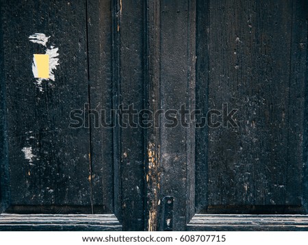 Old blue doors. Wood texture. Texture of metal. Old shabby, irradiated paint