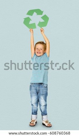 Caucasian Ethnicity Boy holding Recycle Sign