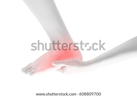 Acute pain in a woman feet isolated on white background. Clipping path on white background