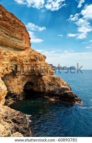 Cave in rock at the sea. Nature composition.