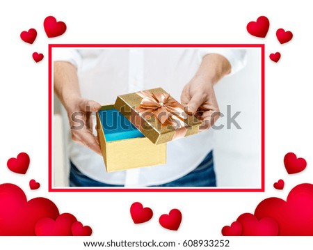 Hearts love background. Male hands holding a gift box. Opened present wrapped with ribbon and bow. Christmas or birthday golden paper package. Man in white shirt. Love postcard.