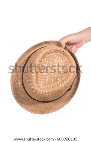 Hand of the woman who was holding a Hat Isolated on white background