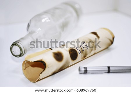 Abstract composition of SOS bottle. Isolated on white background.