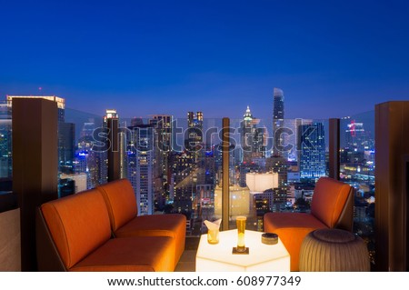 Bangkok city view point from rooftop of building in the Bangkok city downtown in blue sky and city light, Bangkok is the most populated city in Southeast Asia.  Royalty-Free Stock Photo #608977349