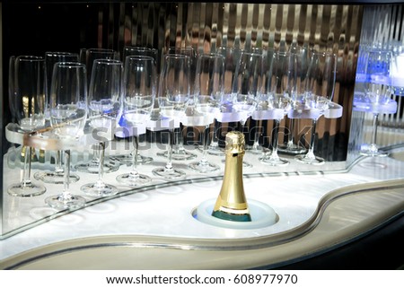 Champagne and glasses in the limousine