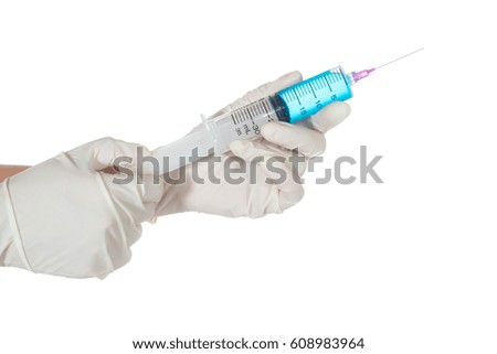Female hand in white glove holding injection needle isolated on white background