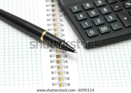 Pen and calculator with shallow depth of field - more similar photos in my portfolio