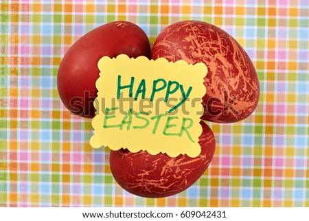 Red dyed eggs. Easter handmade card. Common Easter attributes.