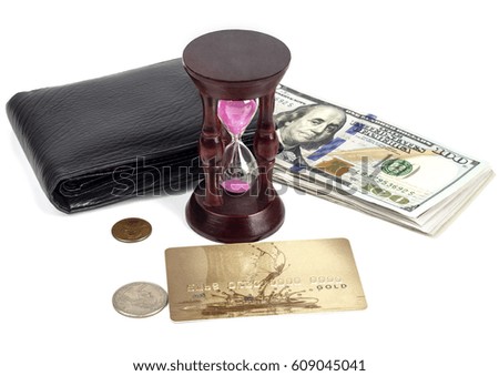 Dollars, cents, a plastic card, a purse, an hourglass