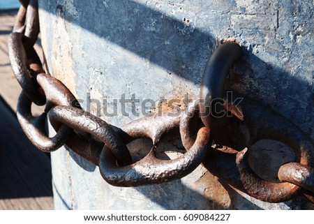 Close up of Rusting Anchor Chain on a boat dock in Santa Monica, California. 