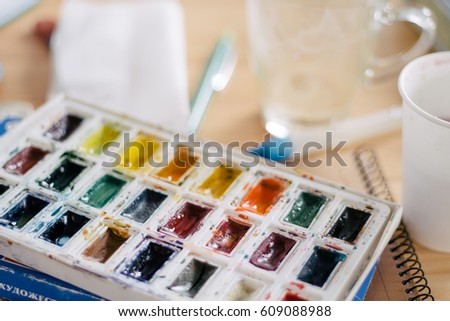 Watercolor painting color, plastic easel creativity,  indoors