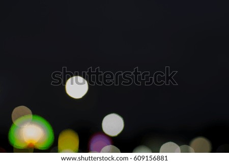 Abstract blur bokeh on black background , defocused of colorful light from the stage