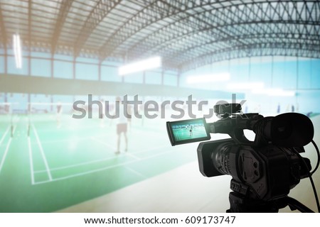 Video camera taking video at badminton court