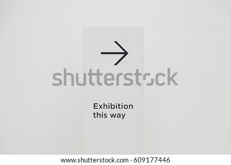 Signage arrow, detail of an information signal, exhibition