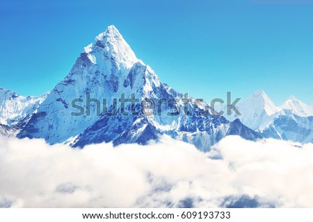 Mountain peak Everest. Highest mountain in the world. National Park, Nepal. Royalty-Free Stock Photo #609193733