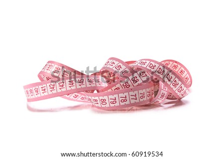 A coiled pink measuring tape isolated over white