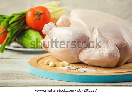 chicken on wooden background. Selective focus. 
