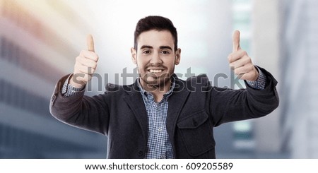 happy with expression of okay young man