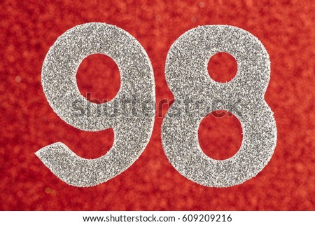 Number ninety-eight silver color over a red background. Anniversary. Horizontal