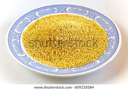 Millet dry in a saucer