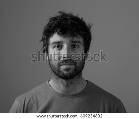 Crazy young man with joke poses. Portrait in Black and white