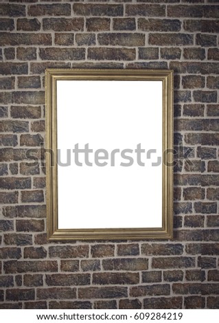 Empty white frame on a wall brick
