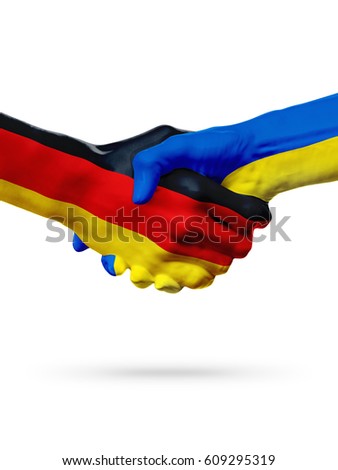 Flags Germany, Ukraine countries, handshake cooperation, partnership, friendship or sports team competition concept, isolated on white