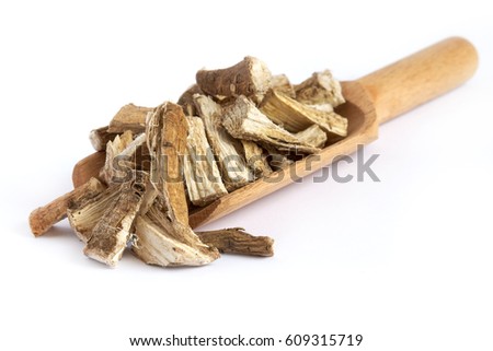 Marshmallow root (Althaea officinalis) in wooden scoop isolated on white background Royalty-Free Stock Photo #609315719