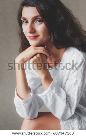 Portrait of charming woman a at home