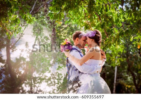 Married Couple in forest  embracing