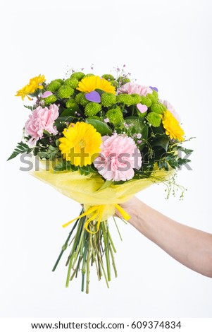  bunch of greenhouse flowers, wrapped in yellow decoration