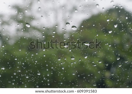 Water droplets on car glass.