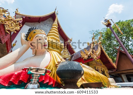 Myanmar style reclining Buddha Image in Thailand Buddhist temple.