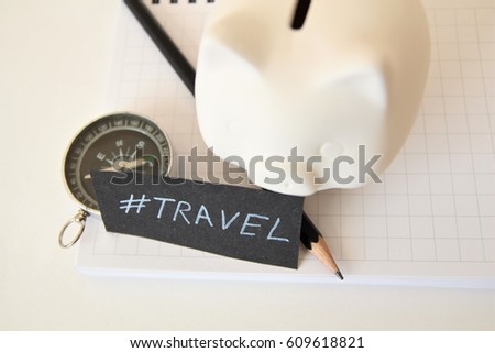 Piggy bank concept for travel. Handwritten