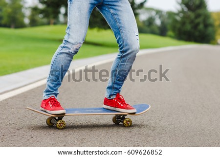 skateboarder girl with skateboard outdoor. Skatebord at city, street. Cool, Funny Tenager