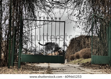 Gate in the greenhouse of the park