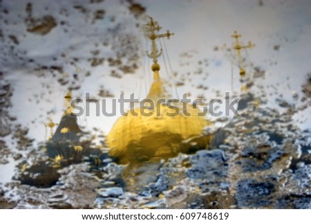 Water reflection of Dormition church of Trinity Sergius Lavra in Sergiyev Posad, Moscow region, Russia. Popular landmark. UNESCO World Heritage Site. Color photo.
