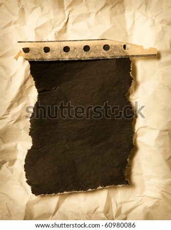 torned carbon paper on wrinkled paper background