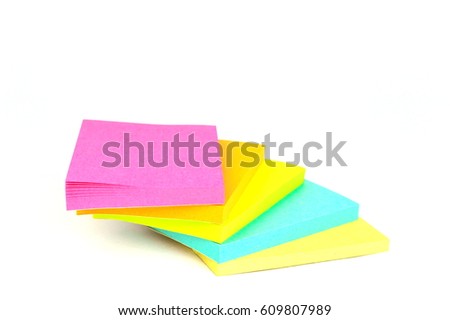 Colored sticky notes isolated on white background. Pink on top