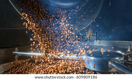 Mixing roasted coffee Royalty-Free Stock Photo #609809186