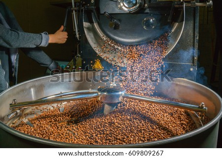 Mixing roasted coffee Royalty-Free Stock Photo #609809267