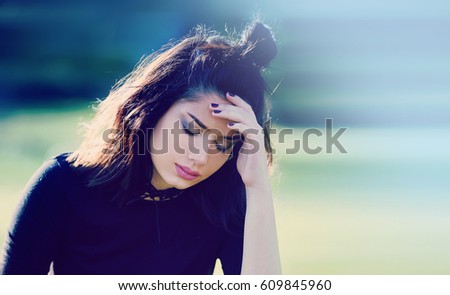 Woman with Migraine. Stress and Depression Concept Royalty-Free Stock Photo #609845960