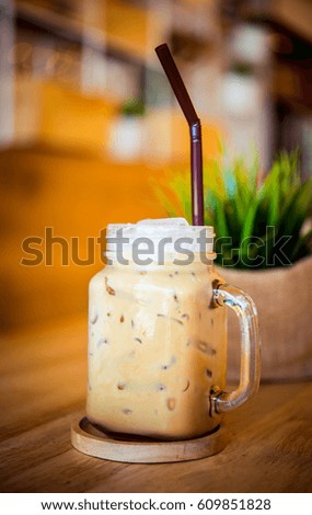 espresso ice coffee in jar place on table