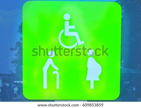 Handicapped pregnant and elderly sign