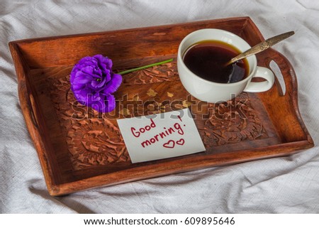 Breakfast in bed. Cup, coffee, red, velvet, cake and note with text Good morning/