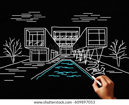 House concept sketched on black board